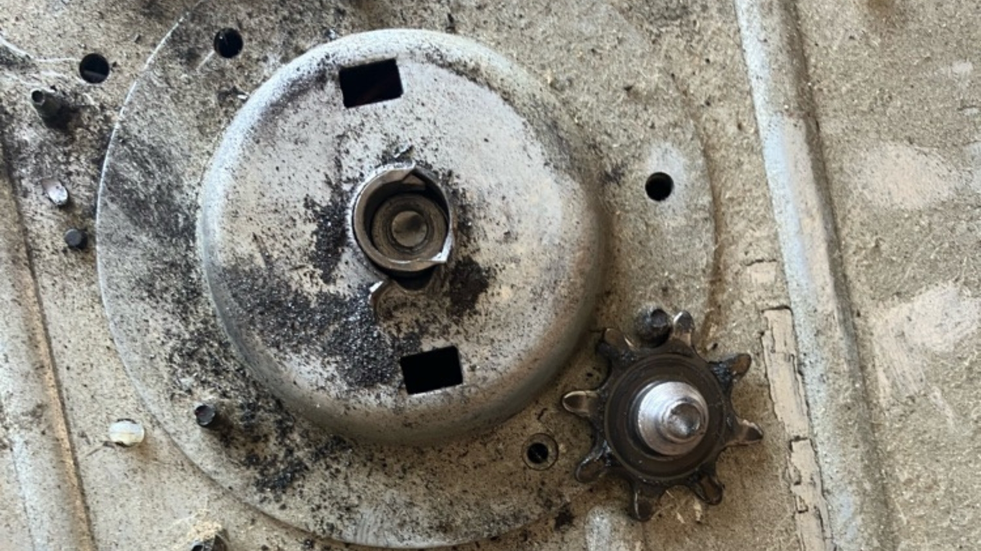 A broken garage door gear and sprocket