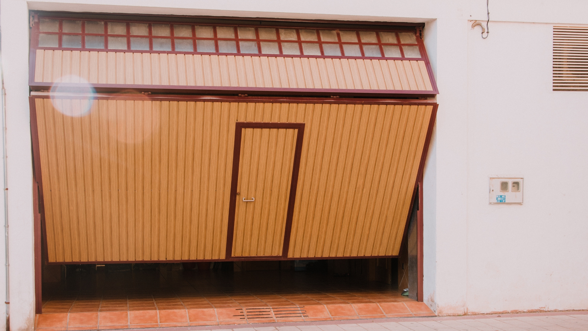 A tilt-up garage door