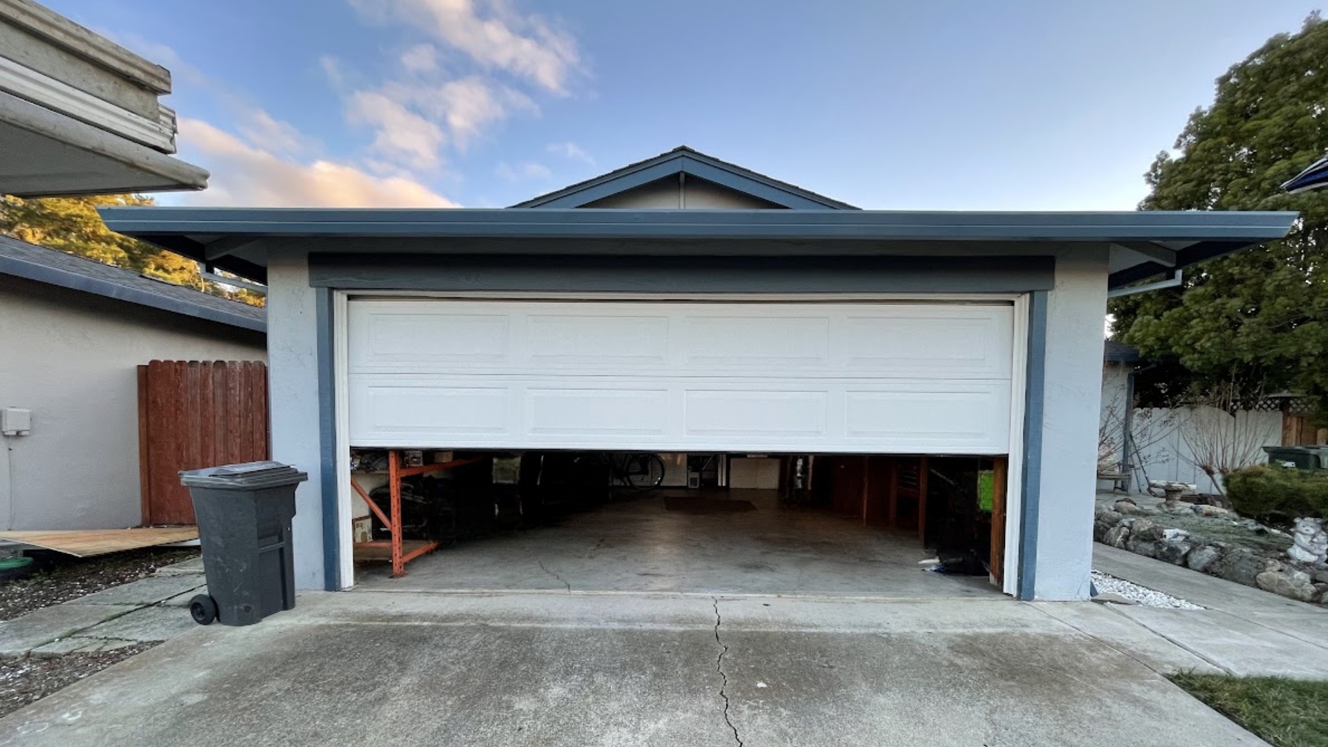 A garage door with adjusted travel limits