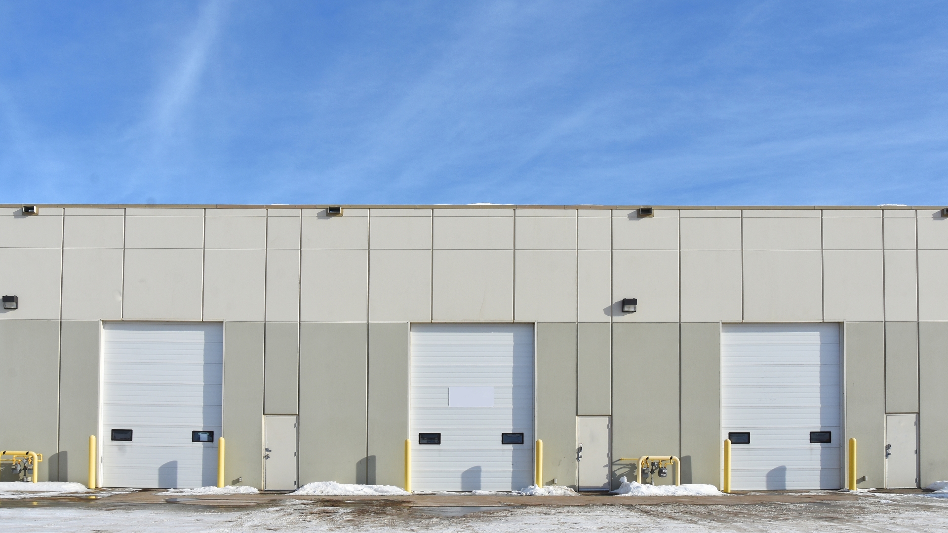 A facility with custom industrial garage doors