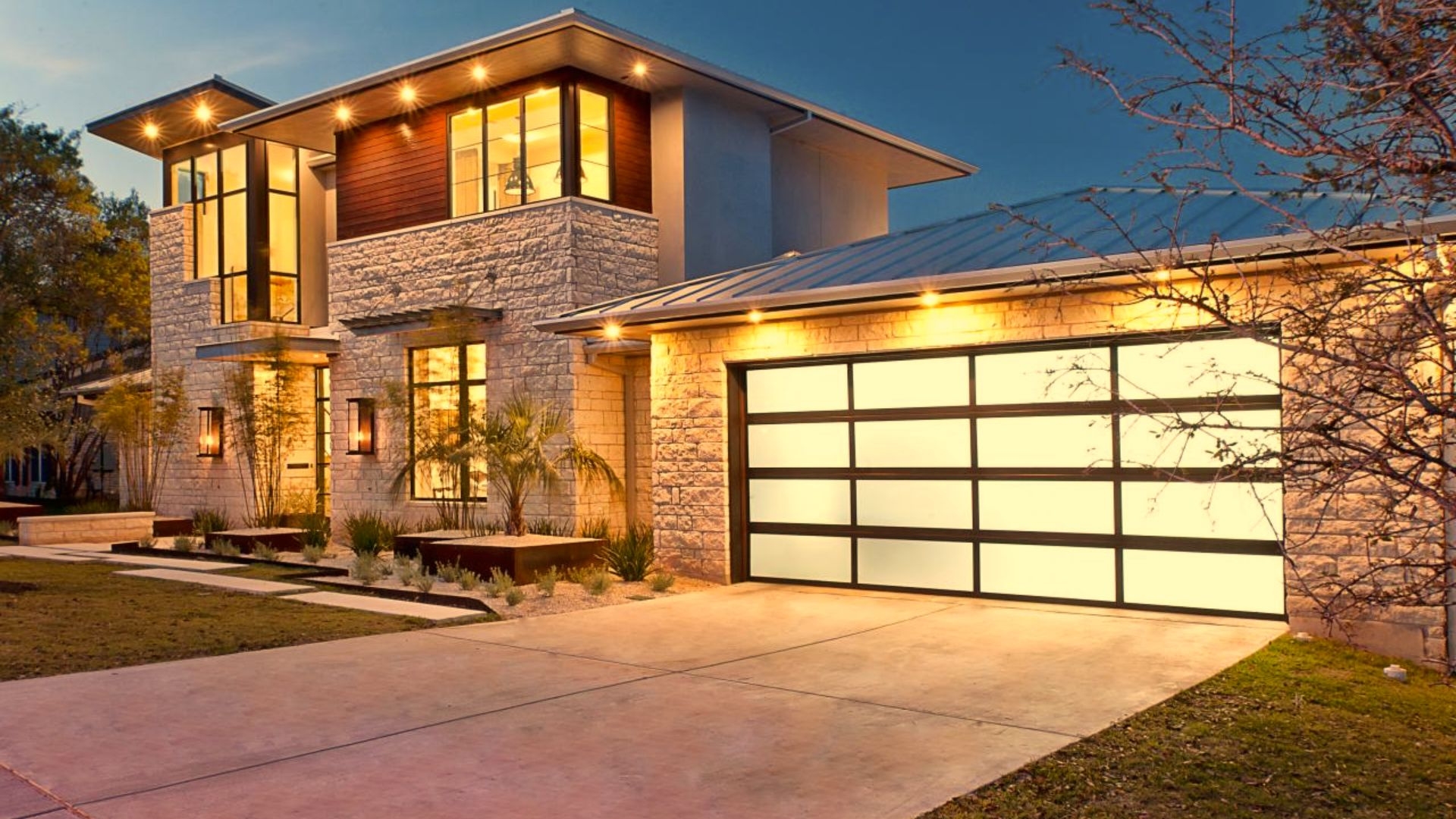 A house with insulated glass garage doors that elevate their curb appeal