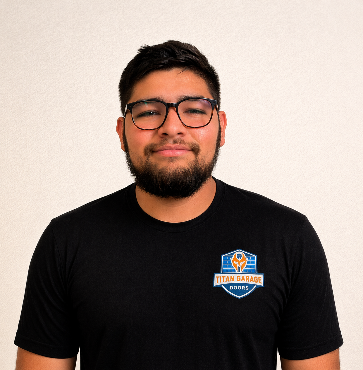 A close-up image of Aidan B., garage door technician at Titan Garage Doors NE