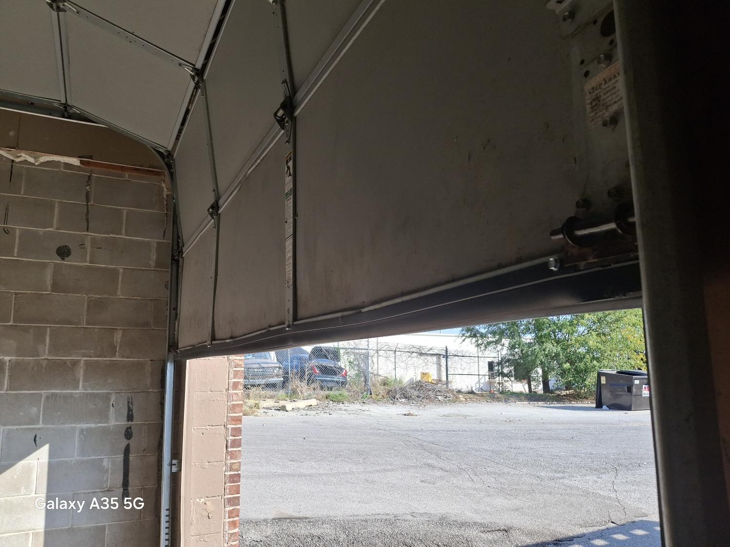 garage door spring replacement garage door spring snapped garage door service near me garage door spring Garage Door Spring Installation Commercial Garage Door Repair 75th St, Omaha, NE