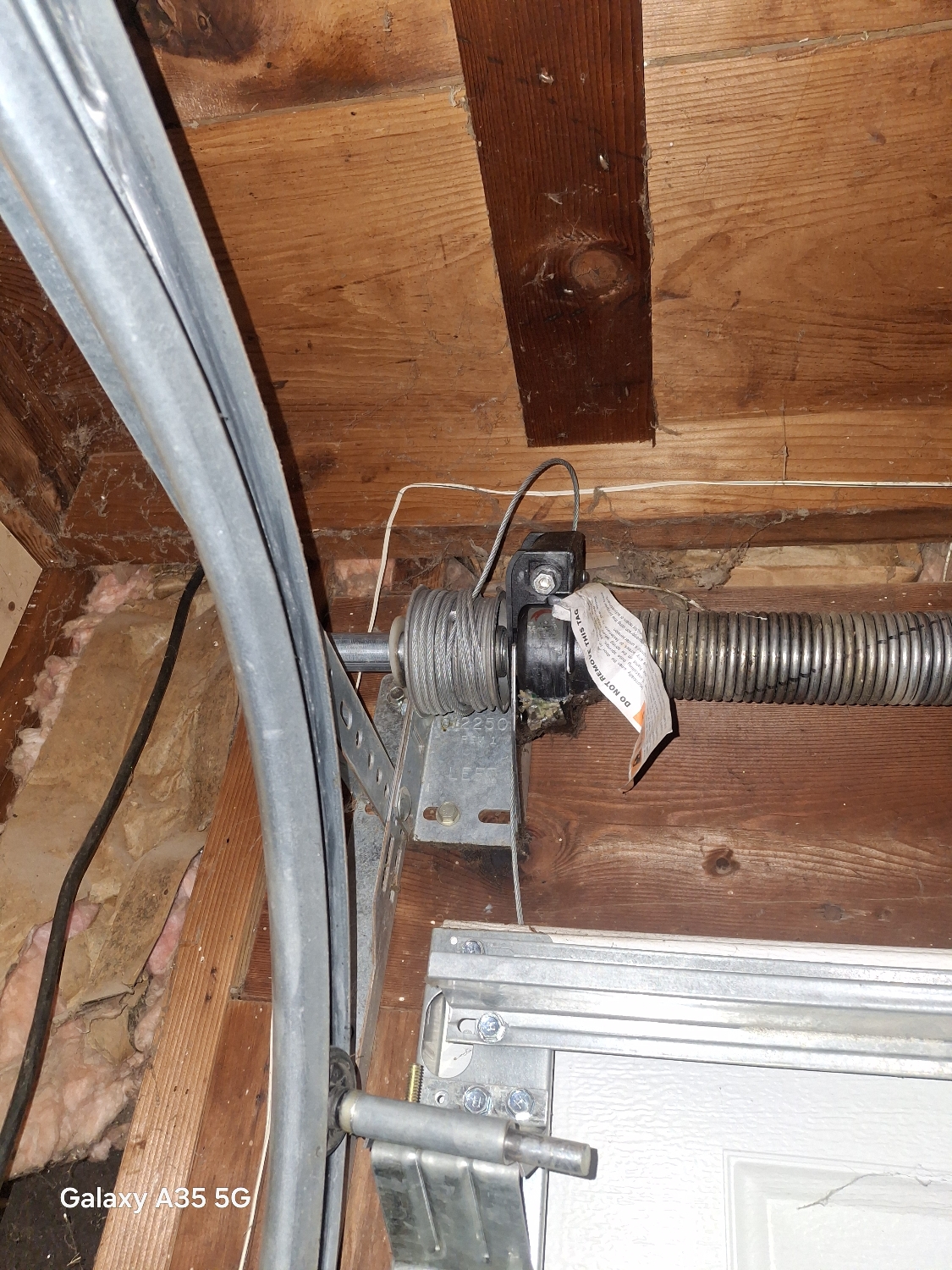 Garage door cable replacement close up