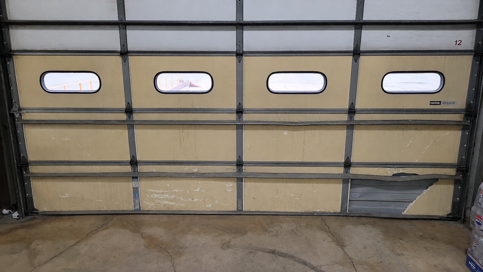 Garage door panel repair