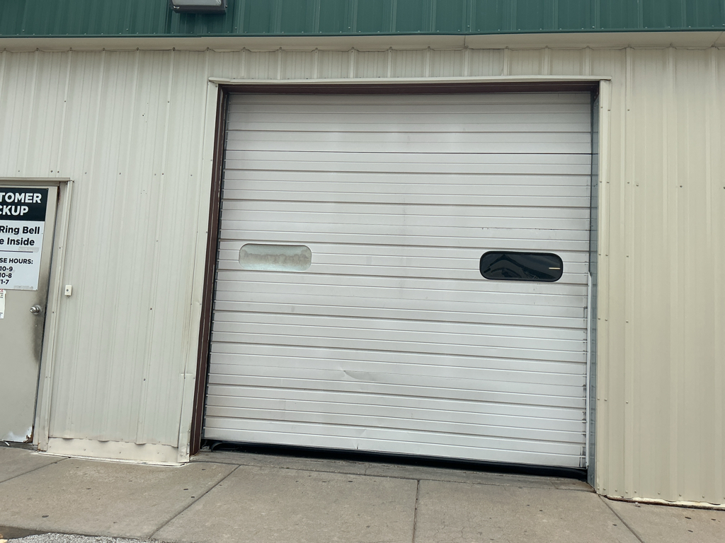 Garage door panel repair