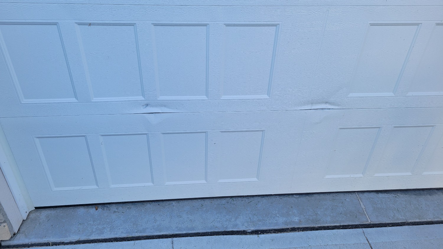 Garage door panel repair