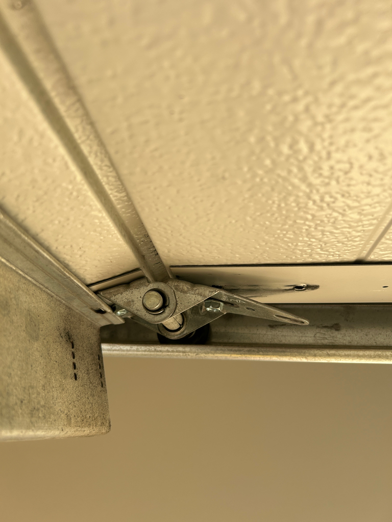 Garage door cable replacement close up