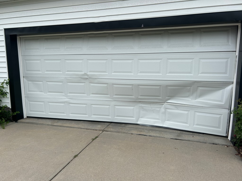 Garage door panel repair