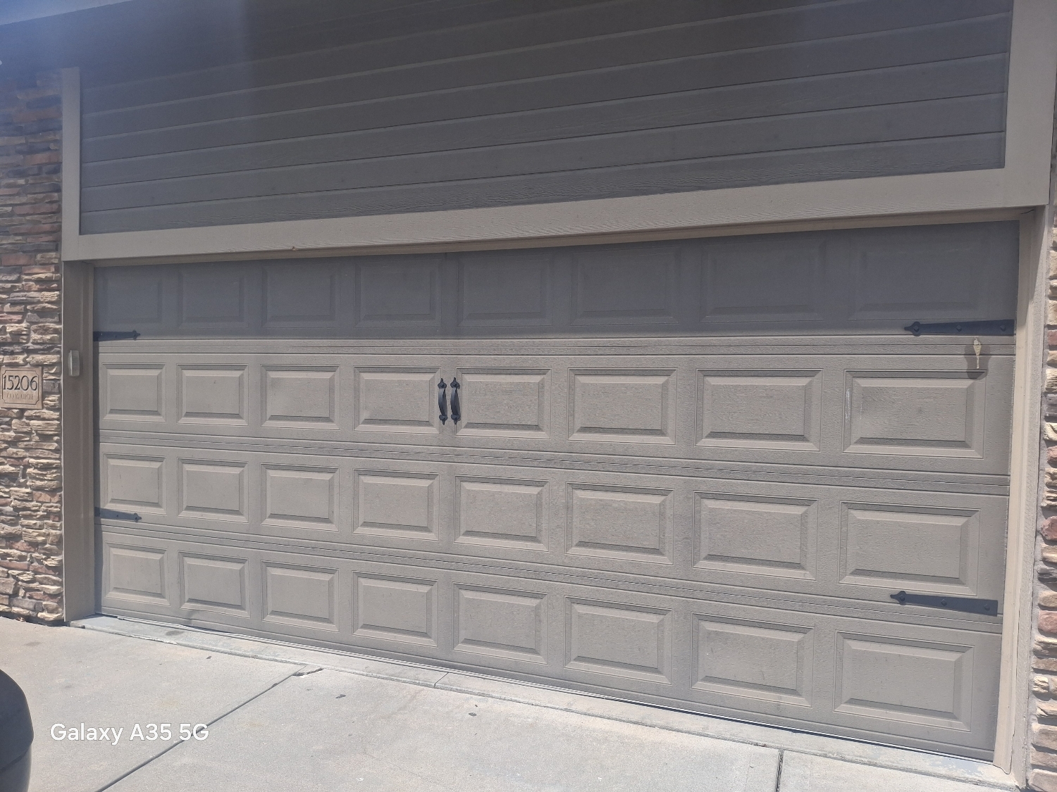 Custom sectional garage door installation for a home