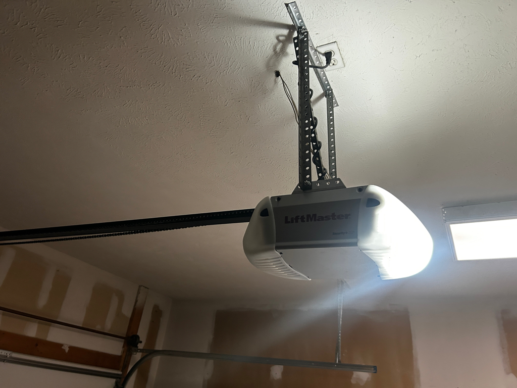 New garage door opener installation with mounted motor
